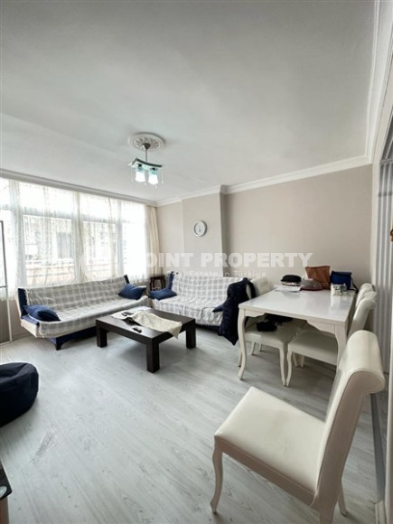 Bright 2+1 apartment with a classic interior in the center of Mahmutlar.-id-4020-photo-1
