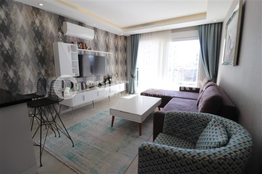 Small modern apartment on the 8th floor with panoramic views of the city and sea.-id-4021-photo-1