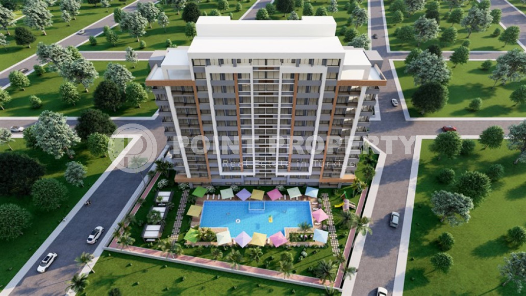 New project in Mersin - apartments with one and two bedrooms on different floors in a house with a swimming pool and a garden. The date for putting the facility into operation is the end of January 2025.-id-4029-photo-1