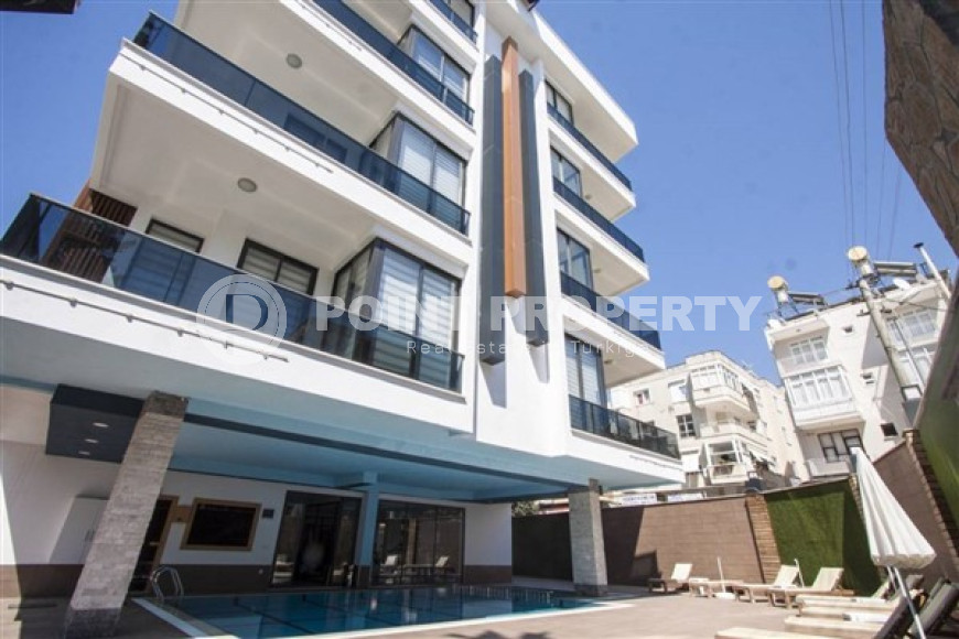 Nice apartments with a 1+1 layout located in the very center of Alanya. Living area 65 m2.-id-4034-photo-1