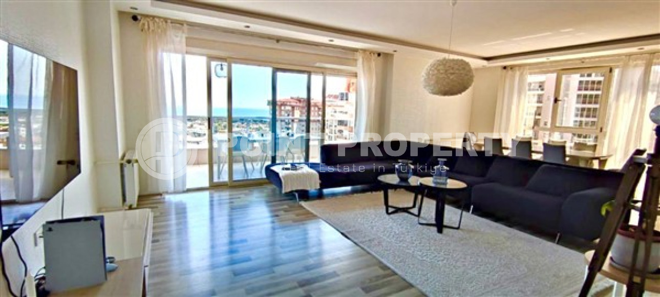 Stylish modern 4+1 apartment on the 9th floor with panoramic views of the city and the sea.-id-4074-photo-1