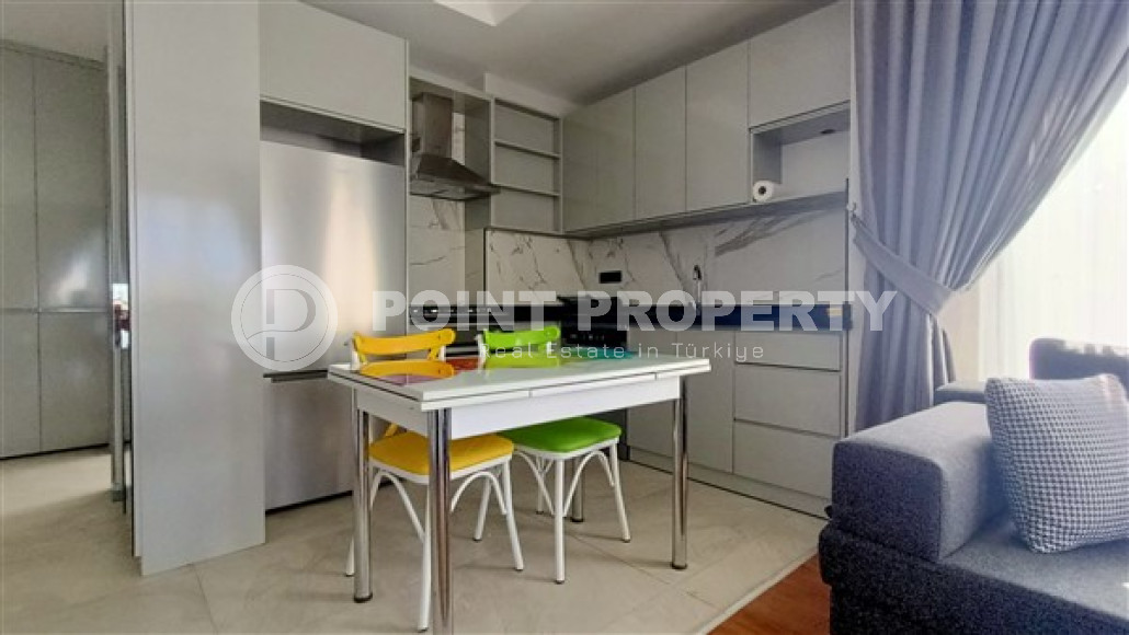 Cozy modern 1+1 apartment with new furniture and appliances 500 meters from the famous Cleopatra Beach.-id-4098-photo-1