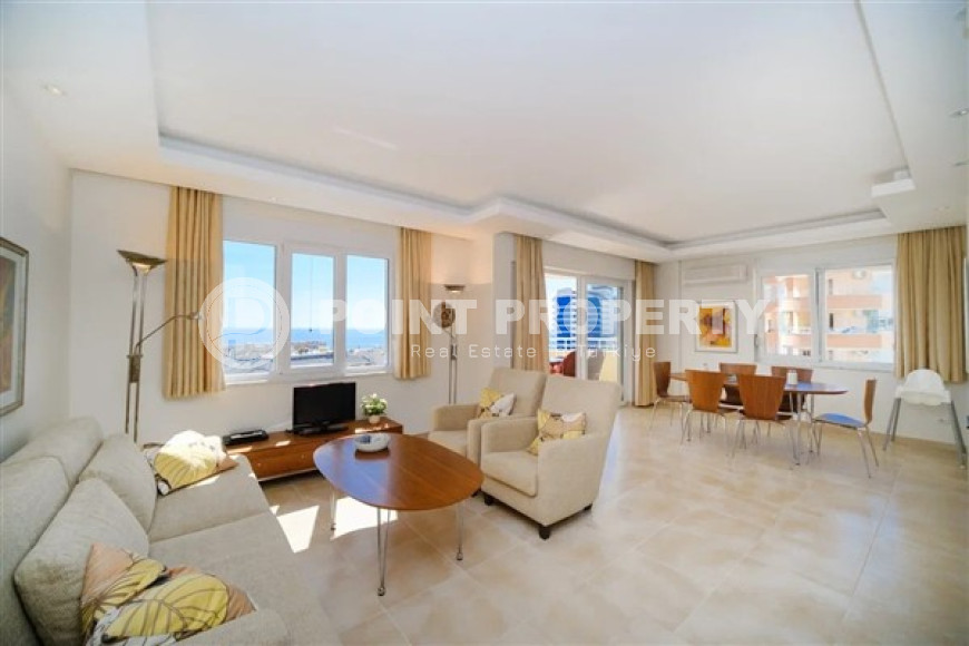 Bright, cozy apartment 2+1 on the 7th floor with panoramic sea views in a quiet area of Alanya Tosmur.-id-4137-photo-1