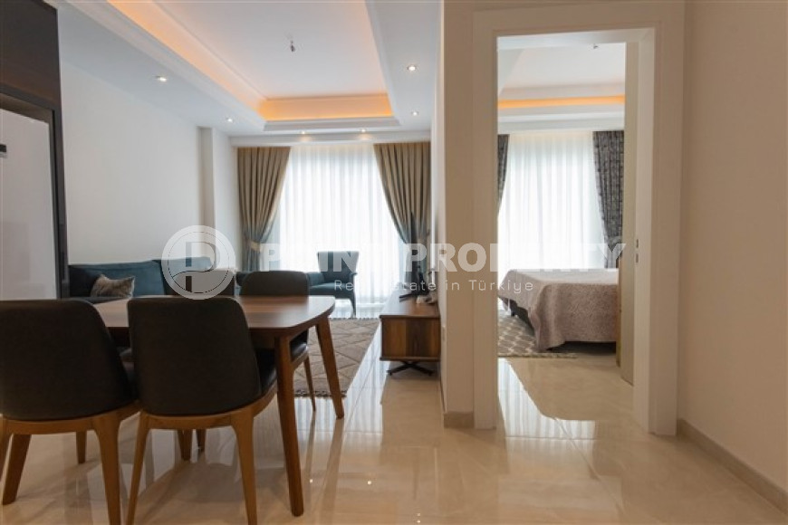 Furnished two-room apartment 1+1 with an area of 65 m2, Mahmutlar-id-4141-photo-1