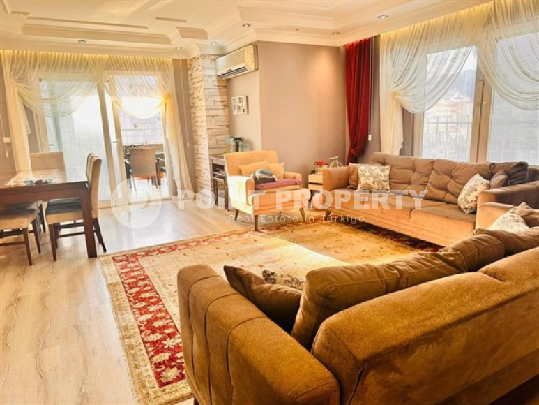 Large two-level apartment on the 10th floor with an attic with panoramic views of the Taurus Mountains. It is possible to obtain a residence permit.-id-4157-photo-1