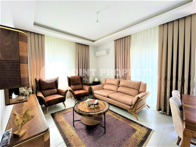 Новая меблированная квартира с качественным ремонтом и приятным дизайном в центре района Махмутлар.-id-4247-фото-1