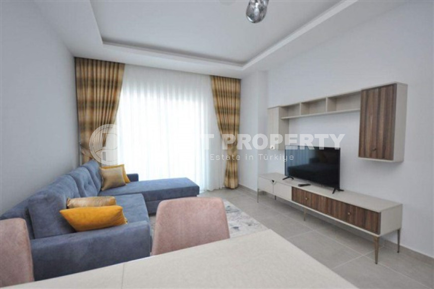 Bright modern apartment on the 6th floor in a building built in 2021, 700 meters from the sea.-id-4268-photo-1
