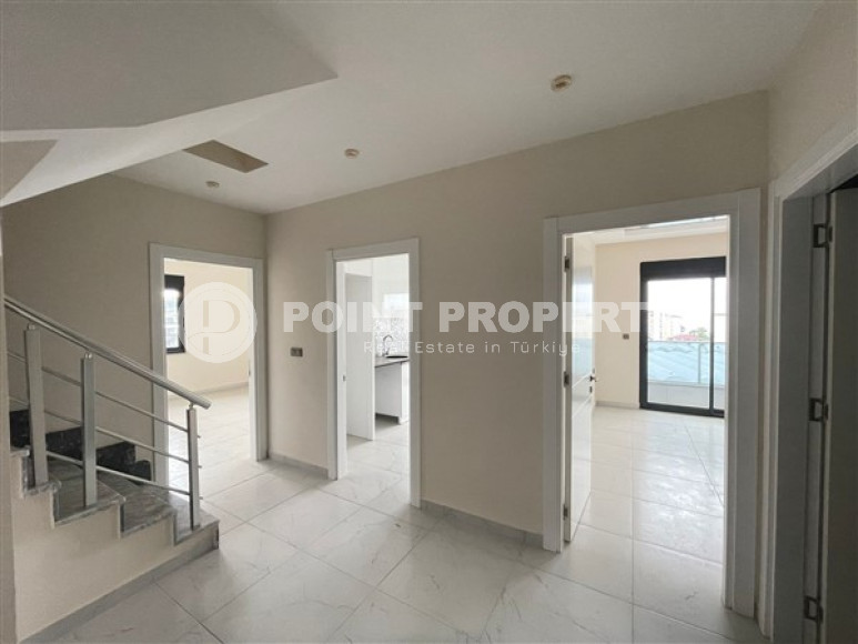 Spacious 4+1 duplex with fine finishing on the 4th floor with an attic in the elite area of Alanya Kargicak.-id-4270-photo-1