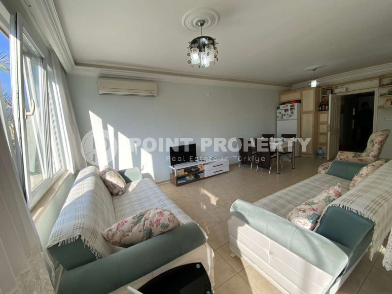 Spacious 2+1 apartment on the 1st floor in a building with a swimming pool and a large green garden.-id-4294-photo-1