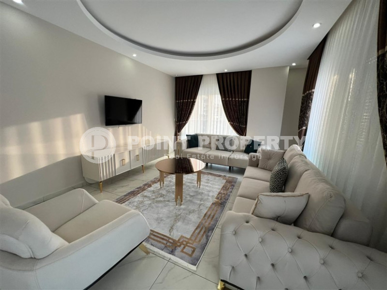 Comfortable 3+1 apartment with a separate kitchen and two balconies, Mahmutlar district-id-4312-photo-1