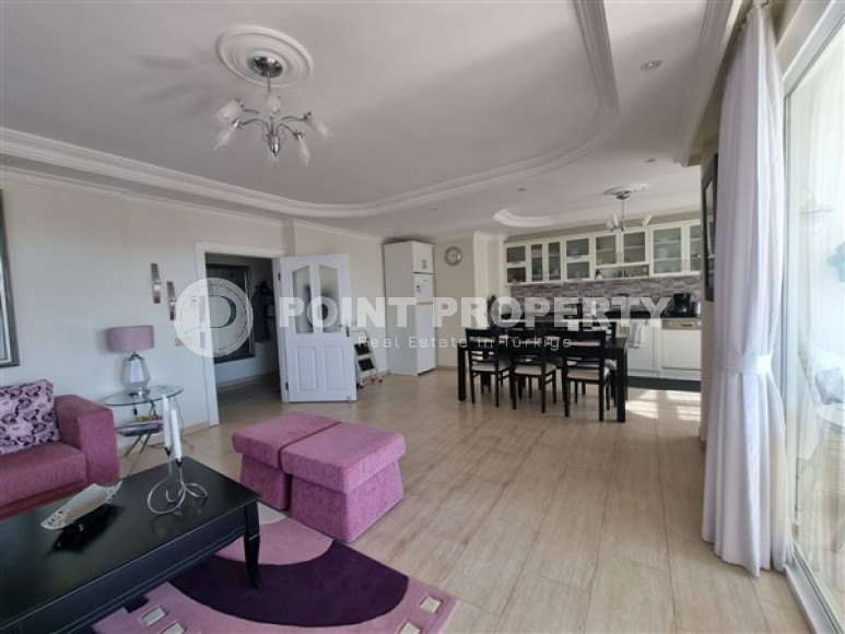 Beautiful bright 3+1 apartment on the 8th floor with panoramic views of the Taurus Mountains.-id-4366-photo-1