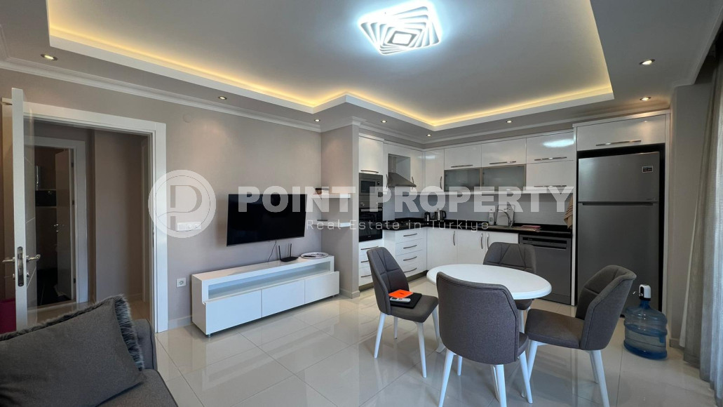 Three-room apartment with an area of 110 m2, equipped with furniture, Oba district-id-4370-photo-1