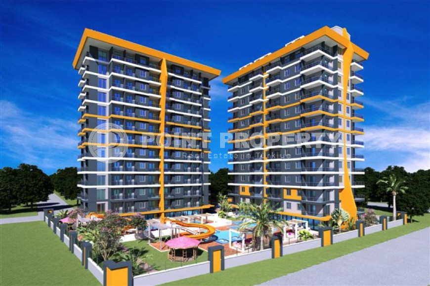 Современные апартаменты 2+1 в строящемся комплексе в 150 метрах от моря, район Махмутлар-id-4436-фото-1