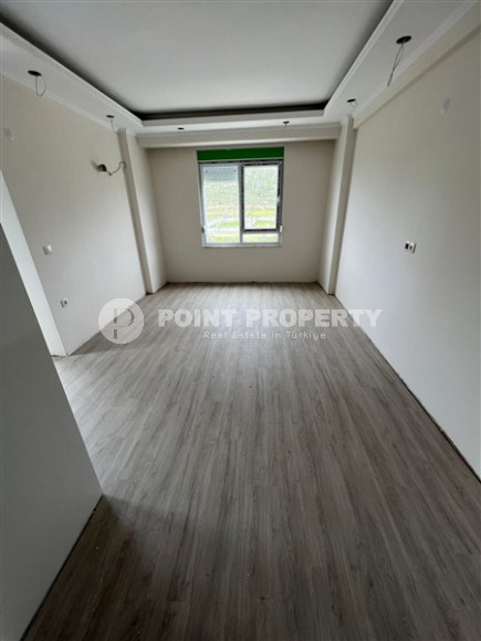 Apartment 65 m2 in a complex at the stage of completion, Gazipasa-id-4437-photo-1
