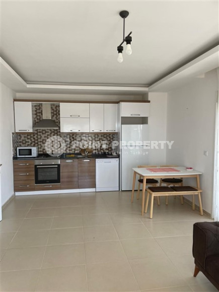 Spacious 1+1 apartment with furniture and household appliances 50 meters from the beach and promenade.-id-4501-photo-1