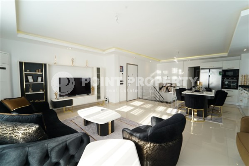 Duplex apartment 175 m2 with four bathrooms and a spacious living room, Mahmutlar district-id-4544-photo-1