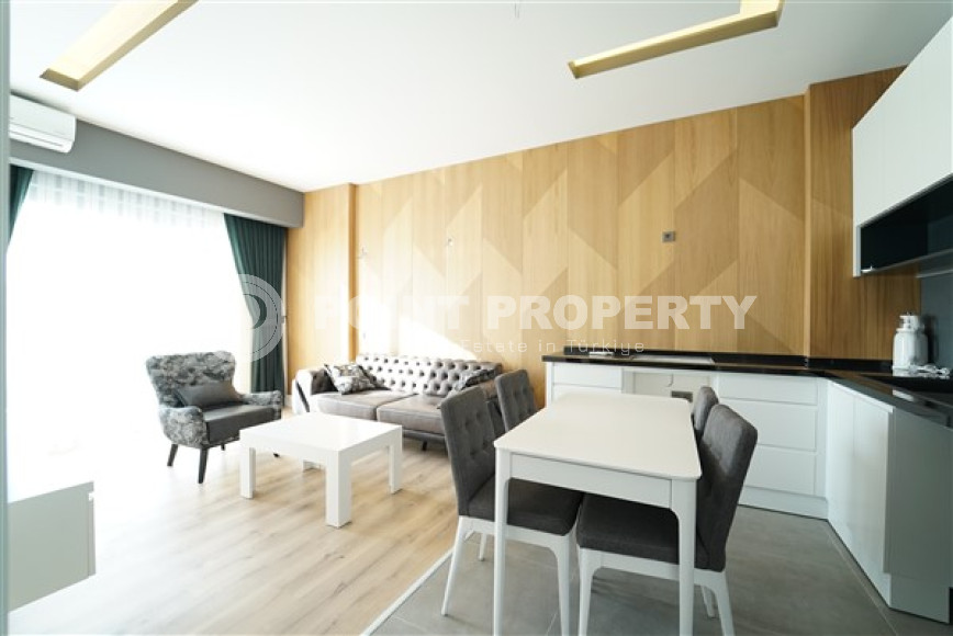 Modern two-room apartment 55 m2 with classic interior rooms, Alanya center-id-4548-photo-1