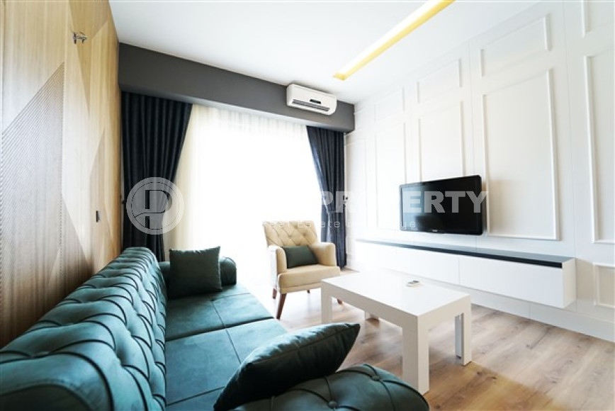 Small stylish apartment in a modern residential complex 350 meters from the beach and promenade.-id-4553-photo-1