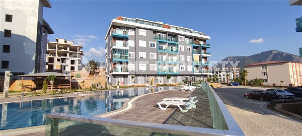 Ready-to-move-in apartment with a 1+1 layout and an area of 60 m2, Oba district-id-4563-photo-1