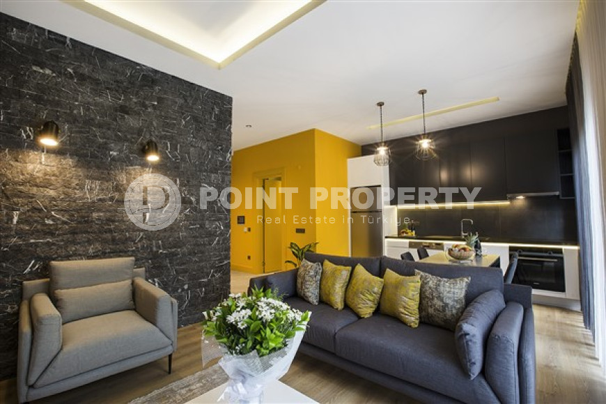 Stylish two-level apartment on the 1st and 2nd floors 350 meters from the sea in the center of Alanya.-id-4576-photo-1