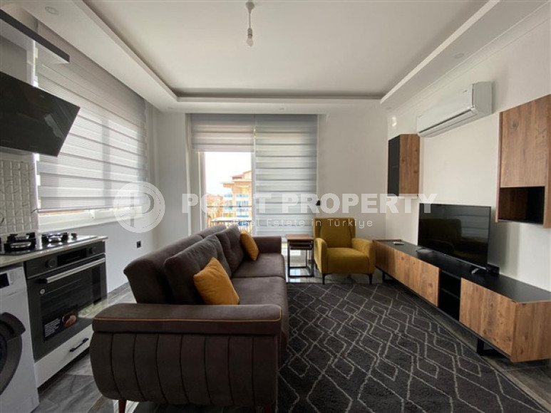 Classic apartment with 1+1 layout in a residence 200 meters from the sea, Kestel-id-4608-photo-1