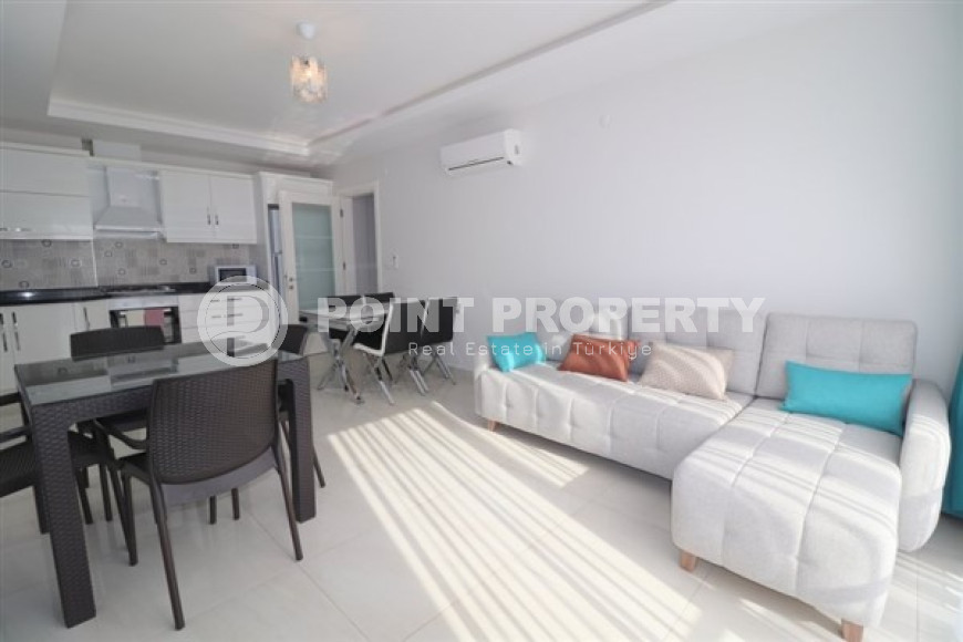 Spacious, bright apartment with modern design 350 meters from the beach in the center of Mahmutlar.-id-4642-photo-1