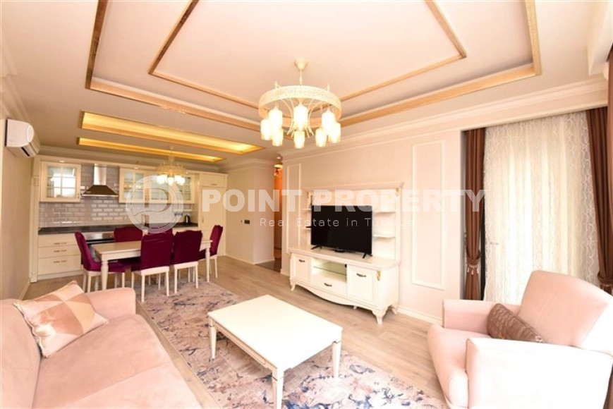 Exquisite apartment with an area of 101 m2 and two balconies 100 meters from the sea, Alanya center-id-4655-photo-1