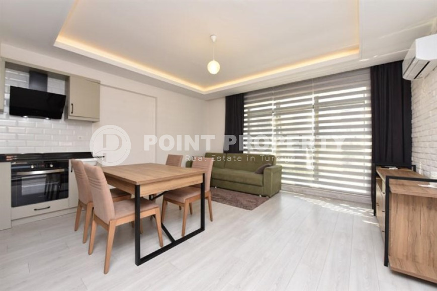 Modern furnished 1+1 apartment 500 meters from the beach in the center of Alanya.-id-4662-photo-1