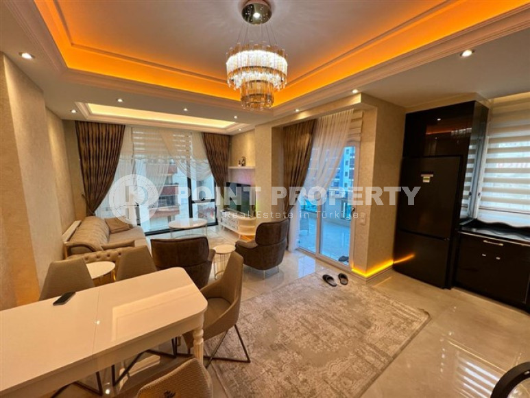 Luxury apartment 65 m2 with furniture on the 2nd floor of a new complex, Mahmutlar-id-4672-photo-1