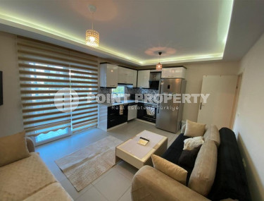 Budget two-room apartment in Mahmutlar, 2nd floor, 60 m2.-id-1384-photo-1