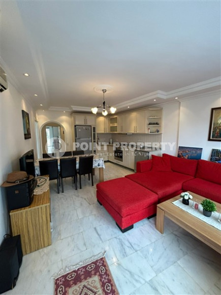 Spacious apartment with two bedrooms 600 meters from the sea in a quiet, landscaped area of Alanya - Tosmur-id-4769-photo-1