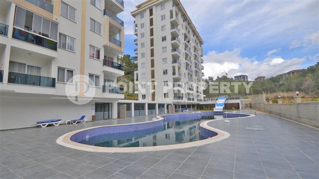 Inexpensive furnished apartment 1+1 with an area of 60 m2, Avsallar district-id-4849-photo-1