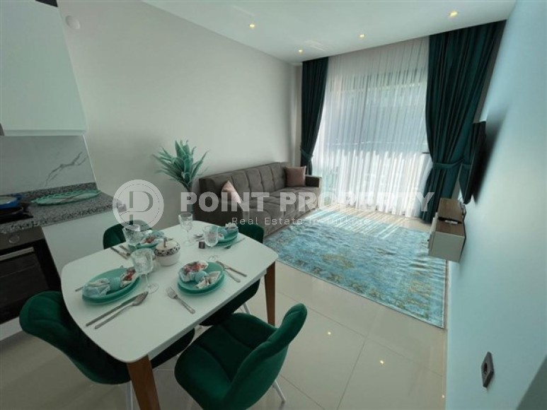 Small apartment with modern renovation, in a premium residential complex, in the Alanya-Kargicak area-id-4873-photo-1