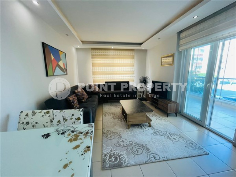 Cozy apartment 2+1, 110m², 350m from the sea in Mahmutlar, in a complex with a swimming pool-id-1403-photo-1