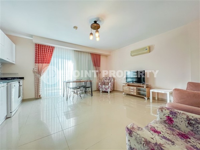 Bright spacious apartment 1+1, total area 65 m2, 100 meters from the beach and promenade-id-4980-photo-1
