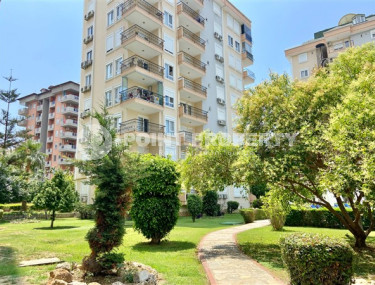 One-bedroom apartment, 55m² in the heart of Alanya in a cozy residence with infrastructure-id-1404-photo-1