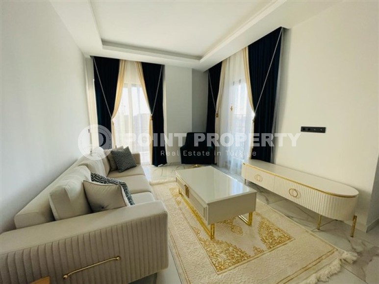 Duplex apartment with three bedrooms in a residential complex built in 2023, in the Mahmutlar area-id-5079-photo-1