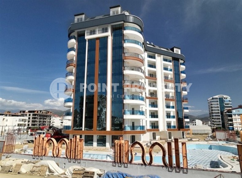 Новые светлые апартаменты с двумя спальными комнатами в современном жилом комплексе, в городе Газипаша-id-5316-фото-1
