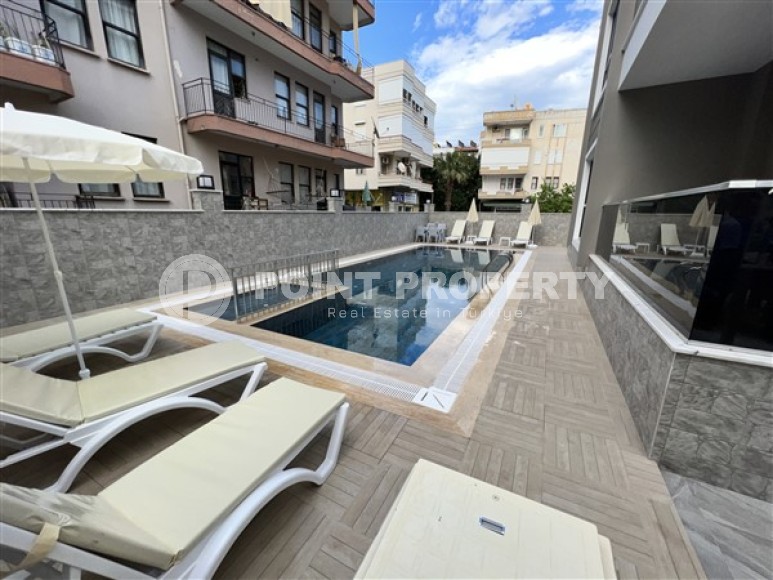 Small apartments with a 1+1 layout, in a new residential complex in the central area of Alanya-id-5345-photo-1