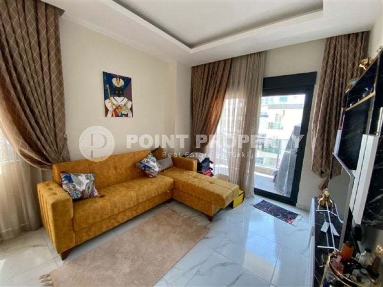 Small furnished apartment 1+1, with a total area of 55 m2, on the 3rd floor in a building commissioned in 2023-id-5382-photo-1