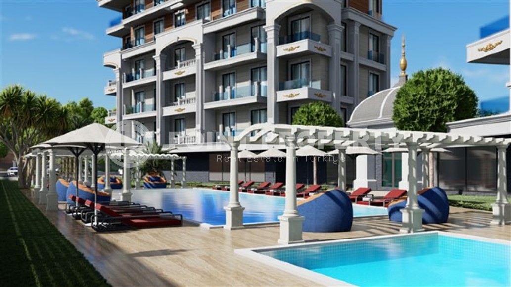 Apartments with layouts 1+1, duplexes 2+1 in a residential complex at the final stage of construction, in the area of Alanya - Turkler-id-5429-photo-1