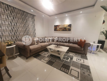 Furnished apartment 1+1, 60m², in an urban building in the very center of Alanya-id-1430-photo-1