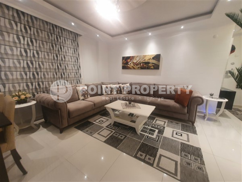 Furnished apartment 1+1, 60m², in an urban building in the very center of Alanya-id-1430-photo-1