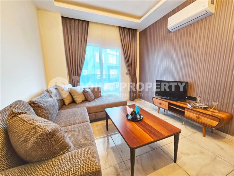 Stylish small apartment with designer renovation, 1+1 layout, in the Mahmutlar area-id-5468-photo-1