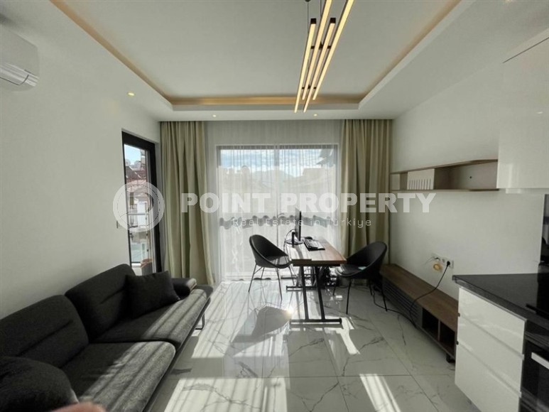 Compact modern apartment 1+1, with a total area of 43 m2, on the 4th floor in a residence built in 2022-id-5486-photo-1