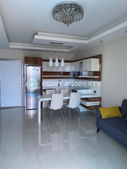 Spacious one bedroom apartment on the first line from the sea in the Mahmutlar area-id-5523-photo-1
