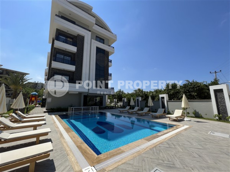 Apartment 1+1 in a residence with infrastructure at the final stage of construction in the Oba area, Alanya-id-1437-photo-1