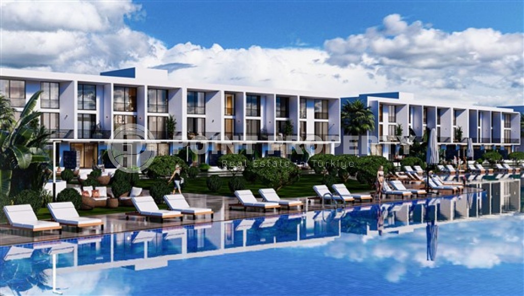 Новый инвестиционный проект на Северном Кипре - апартаменты в роскошном жилом комплексе на этапе строительства в двух километрах от моря-id-5531-фото-1