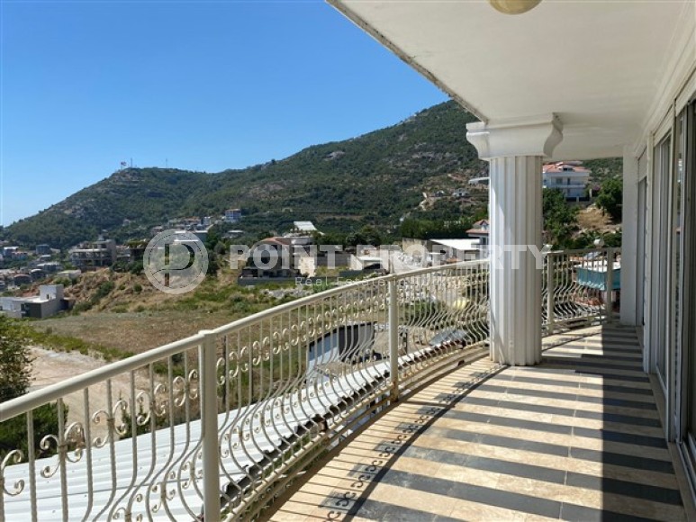 Three-storey detached villa with panoramic views of the sea, mountains and Alanya fortress-id-5550-photo-1