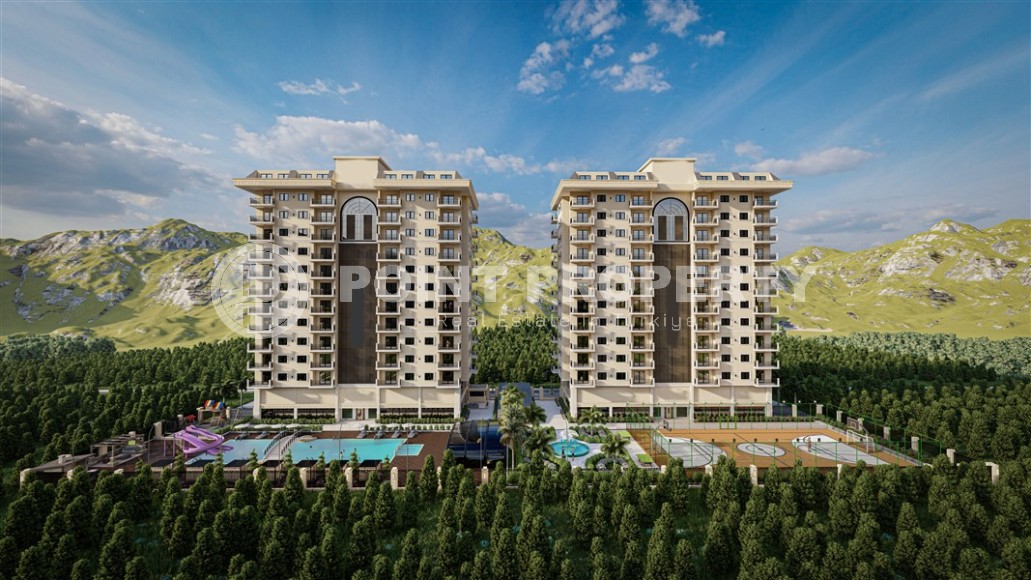 Новый масштабный проект - жилой комплекс на 176 квартир, в 750 метрах от моря, в центре района Махмутлар-id-5589-фото-1